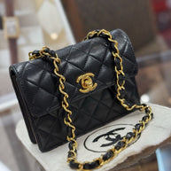Chanel Flap Bag Classic Lambskin Leder Schwarz & Gold Vintage Mini Nano