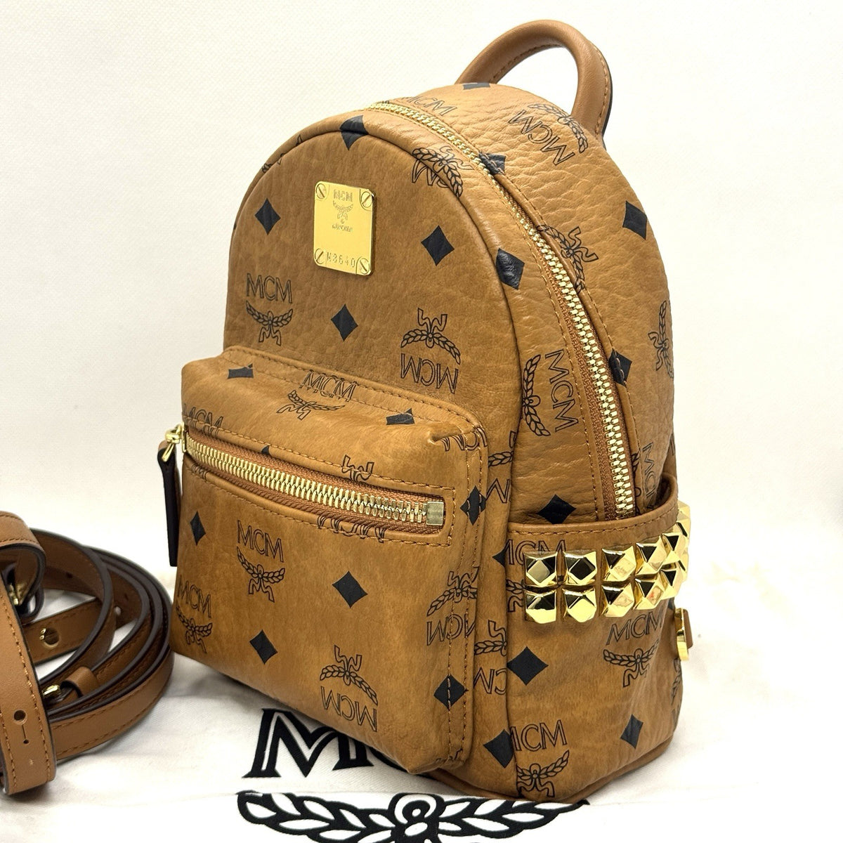 MCM Stark Rucksack Mini Backpack Bebe Boo Cognac mit seitlichen Nieten