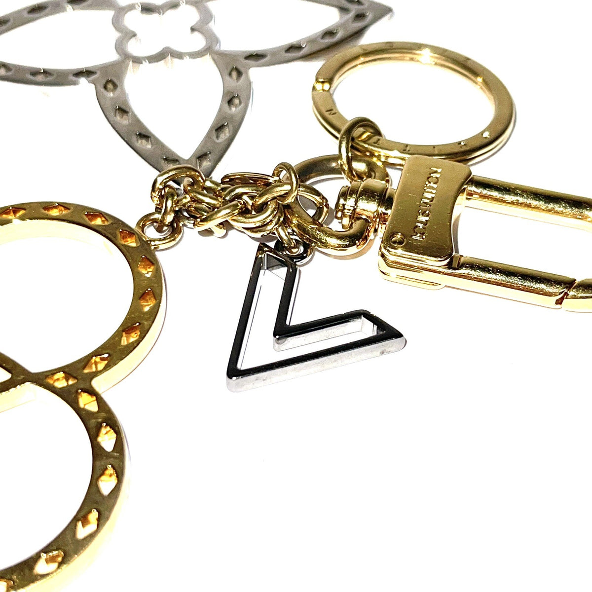 Louis Vuitton Taschen- / Schlüsselanhänger Silber/Gold Carm Neo Tapage M00001