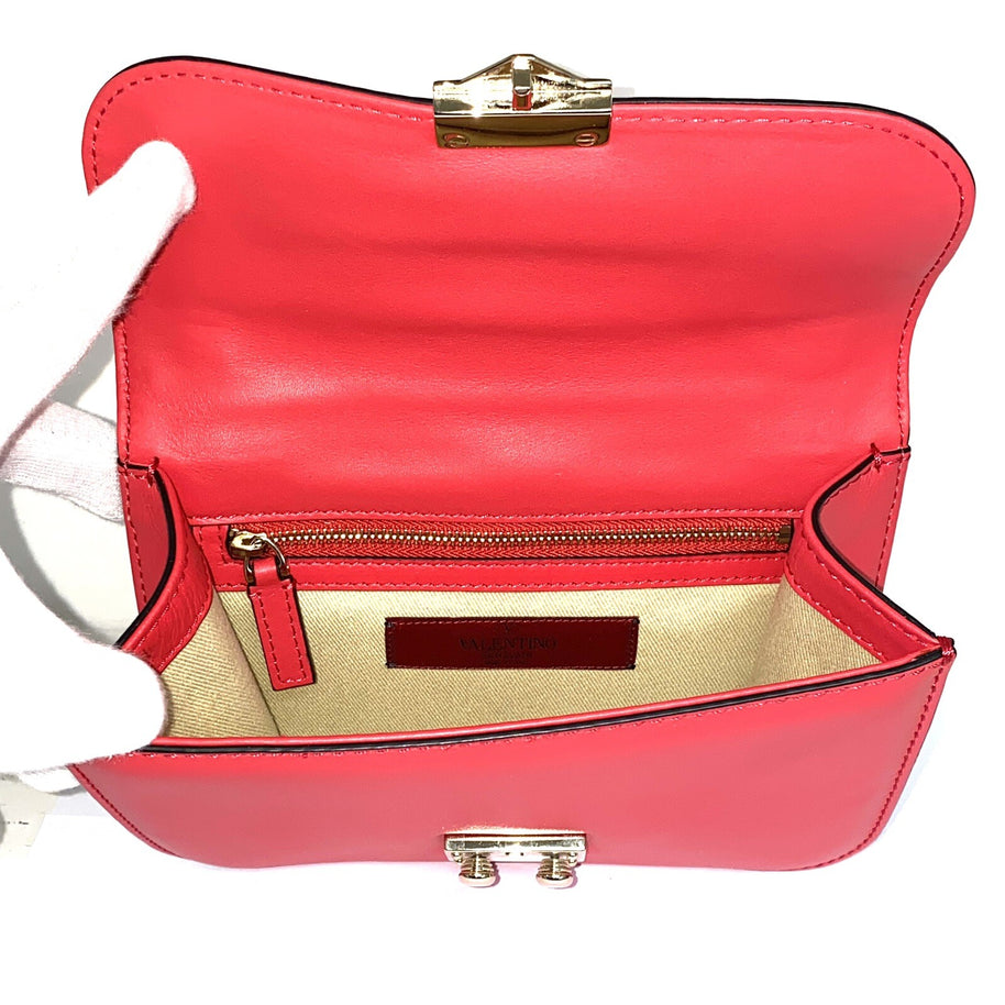 Valentino Garavani Glam Rock kleine Umhängetasche rosa/gold Rockstud