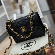 Chanel Flap Bag Classic Lambskin Leder Schwarz & Gold Vintage Mini Nano