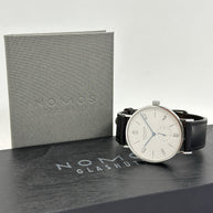 Nomos Glashütte Tangente 38 großes Modell Datum Handaufzug Glasboden Ref. 130