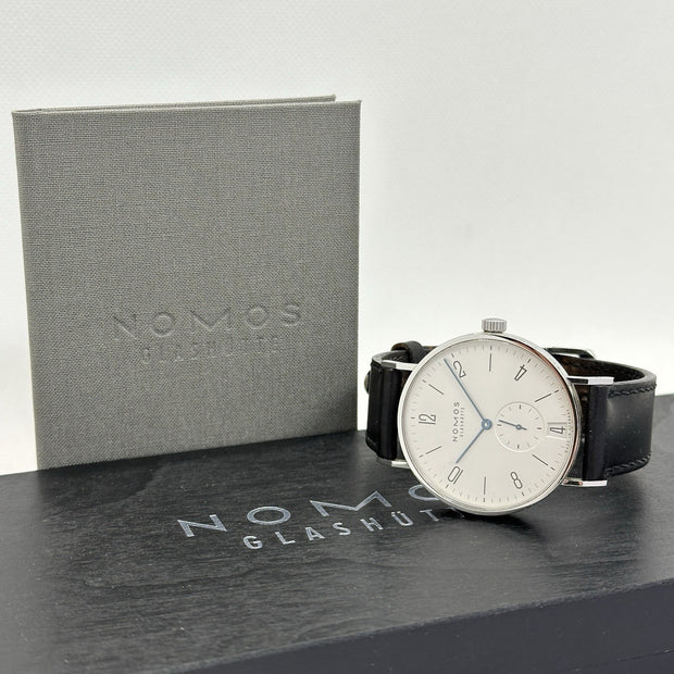 Nomos Glashütte Tangente 38 großes Modell Datum Handaufzug Glasboden Ref. 130