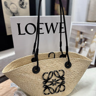 Loewe kleine Anagram Basket Bag aus Iraca-Palme und Kalbsleder Strandtasche