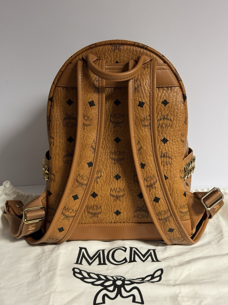 MCM Stark Rucksack + Portemonnaie Flight Print Visetos Cognac