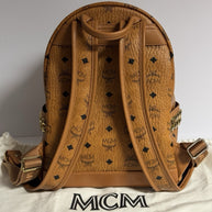 MCM Stark Rucksack + Portemonnaie Flight Print Visetos Cognac