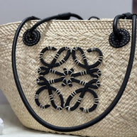 Loewe kleine Anagram Basket Bag aus Iraca-Palme und Kalbsleder Strandtasche