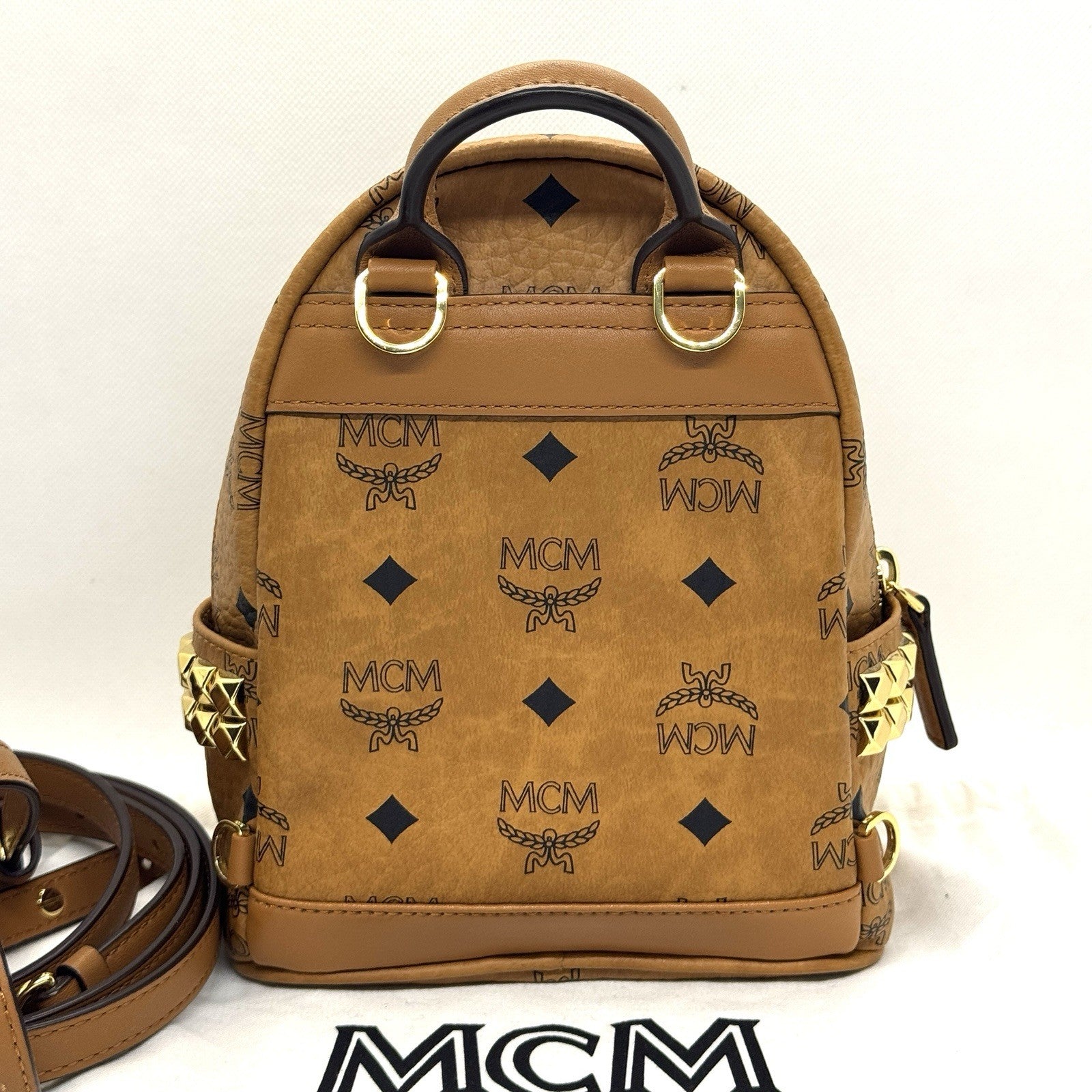 MCM Stark Rucksack Mini Backpack Bebe Boo Cognac mit seitlichen Nieten