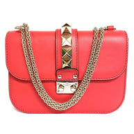Valentino Garavani Glam Rock kleine Umhängetasche rosa/gold Rockstud