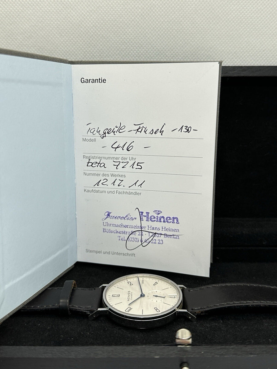 Nomos Glashütte Tangente 38 großes Modell Datum Handaufzug Glasboden Ref. 130