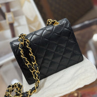 Chanel Flap Bag Classic Lambskin Leder Schwarz & Gold Vintage Mini Nano