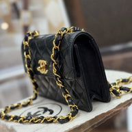 Chanel Flap Bag Classic Lambskin Leder Schwarz & Gold Vintage Mini Nano