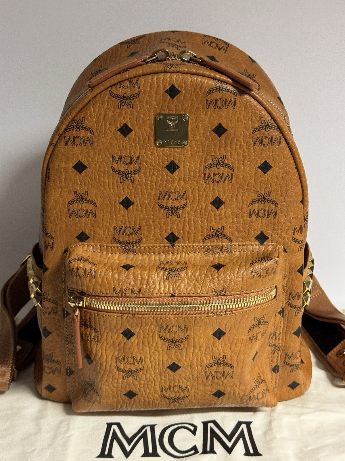 MCM Stark Rucksack + Portemonnaie Flight Print Visetos Cognac