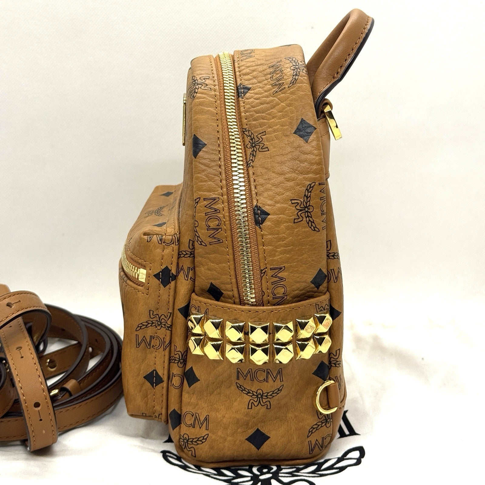 MCM Stark Rucksack Mini Backpack Bebe Boo Cognac mit seitlichen Nieten