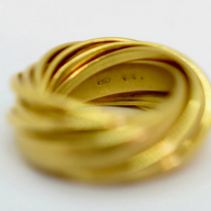 Pomellato Trinity Ring aus 18K Gelbgold – 11 verschlungene Ringe, Größe 54