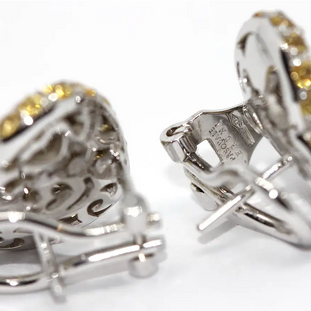 Pasquale Bruni Herz-Ohrstecker aus 18 Karat Weißgold mit Diamanten und gelben Saphiren