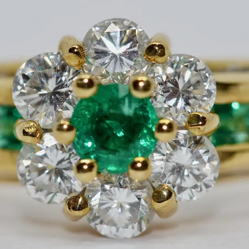 Türler Ring aus 18 Karat Gelbgold mit Diamanten und Smaragden