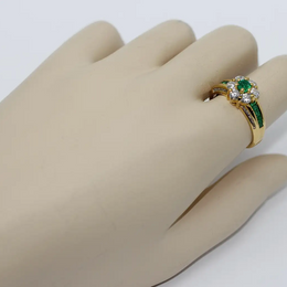 Türler Ring aus 18 Karat Gelbgold mit Diamanten und Smaragden