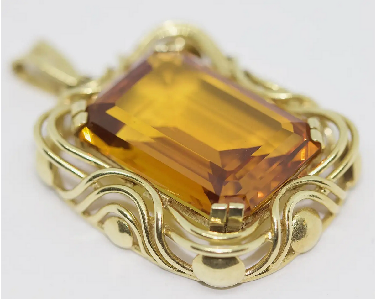 Anhänger Gelbgold mit großem Citrin im Smaragdschliff