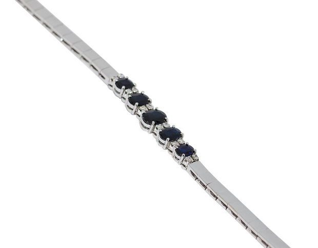 Tennisarmband aus 18 Karat Weißgold mit Saphiren und Diamanten