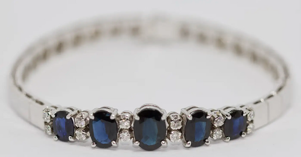 Tennisarmband aus 18 Karat Weißgold mit Saphiren und Diamanten