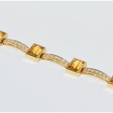 Armband aus 18 Karat Gelbgold mit Citrinen und 41 Diamanten