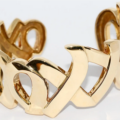 Tiffany & Co. Paloma Picasso Armreif „Love & Kisses XO“ aus 18 Karat Gelbgold