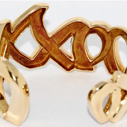 Tiffany & Co. Paloma Picasso Armreif „Love & Kisses XO“ aus 18 Karat Gelbgold