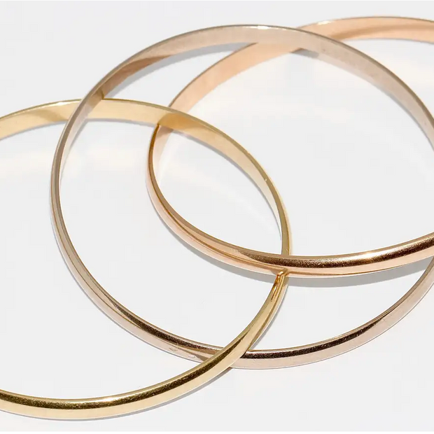 Cartier „Trinity“ Armreif MD aus 18 Karat Gelb-, Weiß- und Roségold