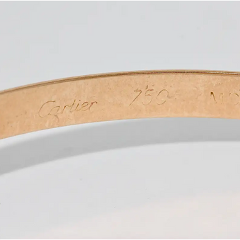 Cartier „Trinity“ Armreif MD aus 18 Karat Gelb-, Weiß- und Roségold