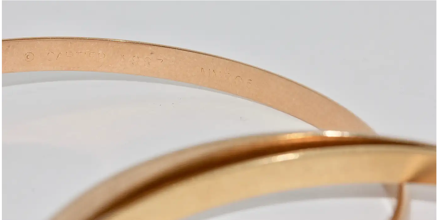 Cartier „Trinity“ Armreif MD aus 18 Karat Gelb-, Weiß- und Roségold