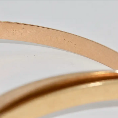 Cartier „Trinity“ Armreif MD aus 18 Karat Gelb-, Weiß- und Roségold