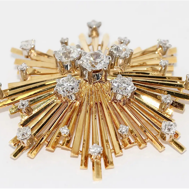 Brosche „Sternexplosion“ in 18 Karat Gelbgold mit Diamanten