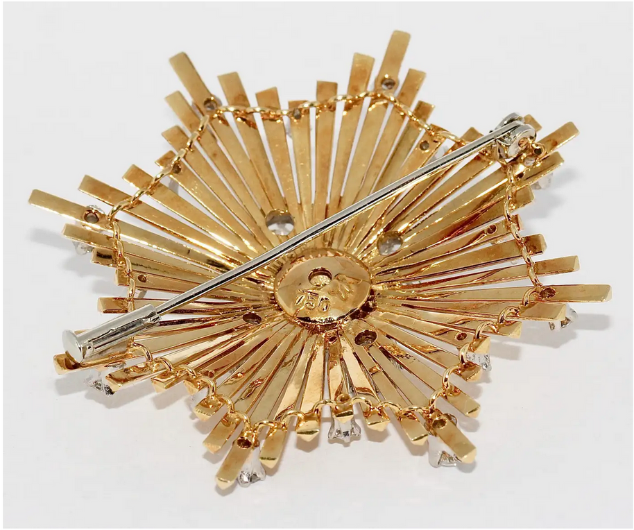 Brosche „Sternexplosion“ in 18 Karat Gelbgold mit Diamanten