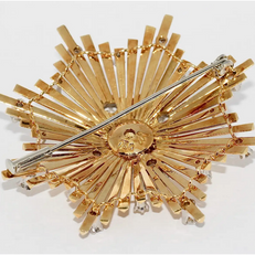 Brosche „Sternexplosion“ in 18 Karat Gelbgold mit Diamanten