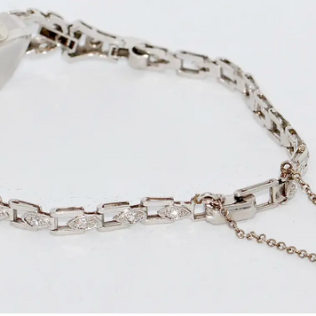 Antike Damenarmbanduhr aus Platin mit Diamanten – Jugendstil