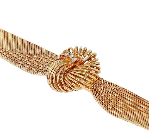 Universal Genève Damenarmbanduhr aus 18 Karat Gold mit Diamanten – multifunktional als Uhr & Brosche