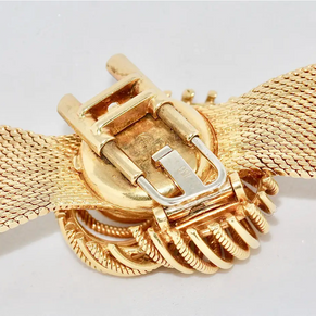 Universal Genève Damenarmbanduhr aus 18 Karat Gold mit Diamanten – multifunktional als Uhr & Brosche