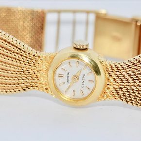 Universal Genève Damenarmbanduhr aus 18 Karat Gold mit Diamanten – multifunktional als Uhr & Brosche