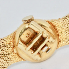 Universal Genève Damenarmbanduhr aus 18 Karat Gold mit Diamanten – multifunktional als Uhr & Brosche