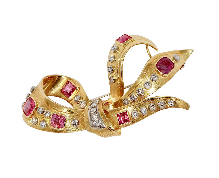 Elegante Brosche aus 18 Karat Gold mit Rubinen und Diamanten