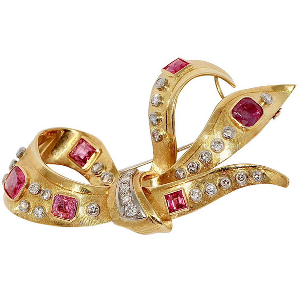 Elegante Brosche aus 18 Karat Gold mit Rubinen und Diamanten