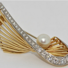 18 Karat Goldbrosche mit Diamanten und Perle
