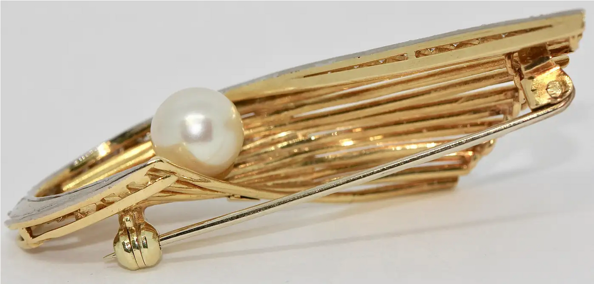 18 Karat Goldbrosche mit Diamanten und Perle