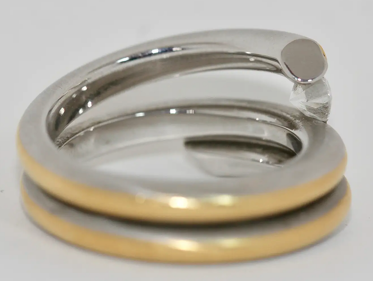 Modernistischer Solitärring aus 950 Platin und 21,6 Karat Gelbgold mit 0,53 ct Diamant (D/IF)