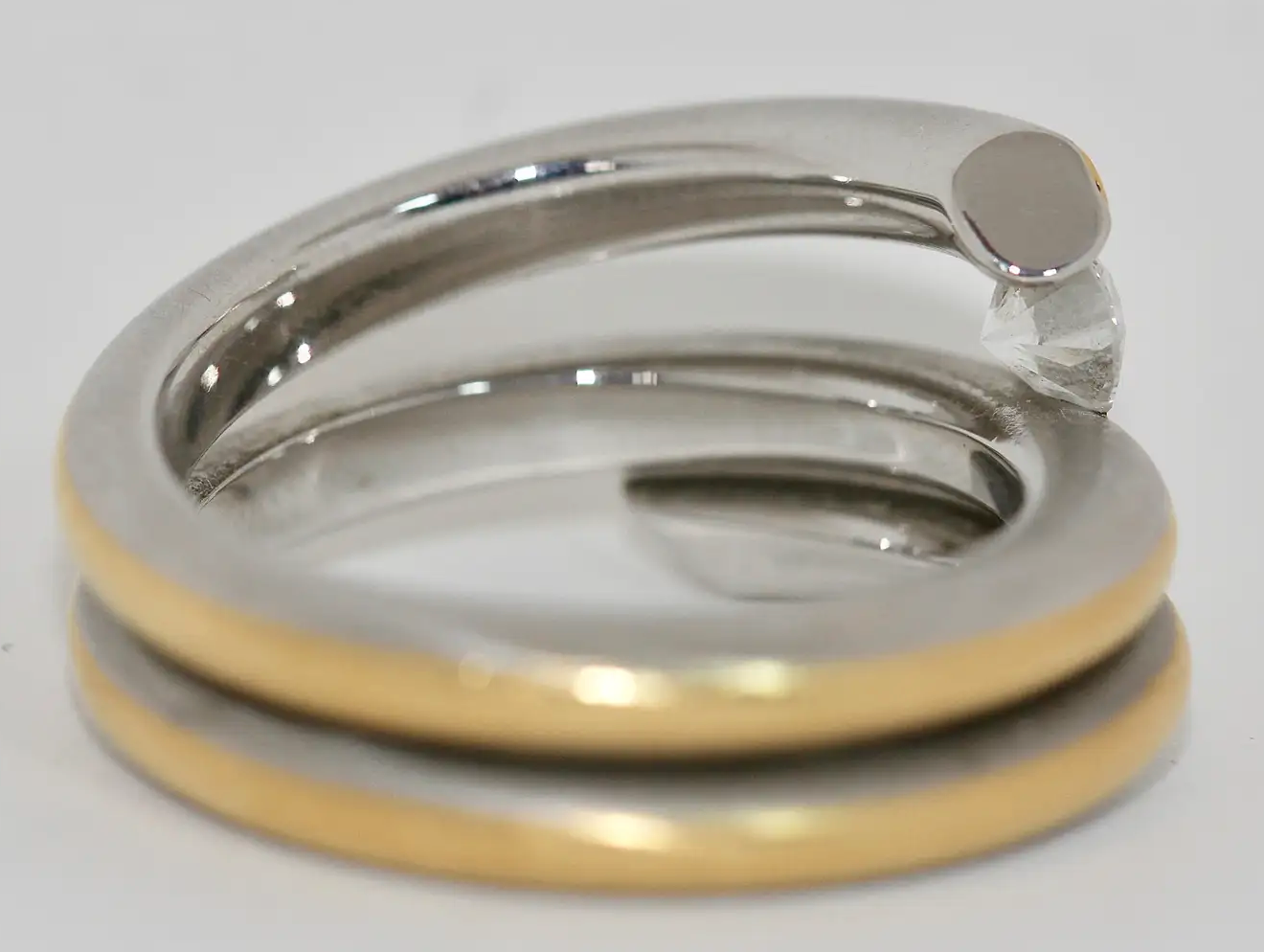 Modernistischer Solitärring aus 950 Platin und 21,6 Karat Gelbgold mit 0,53 ct Diamant (D/IF)