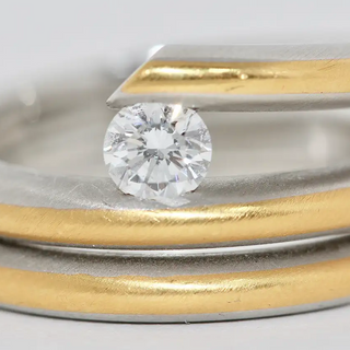 Modernistischer Solitärring aus 950 Platin und 21,6 Karat Gelbgold mit 0,53 ct Diamant (D/IF)