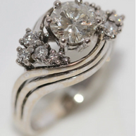 Solitärring aus 18 Karat Weißgold mit 1.05 ct Diamant und Brillanten