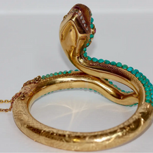 Prächtiger Schlangen-Reif Gelbgold mit Türkisen, Rubinen und Diamanten – um 1900