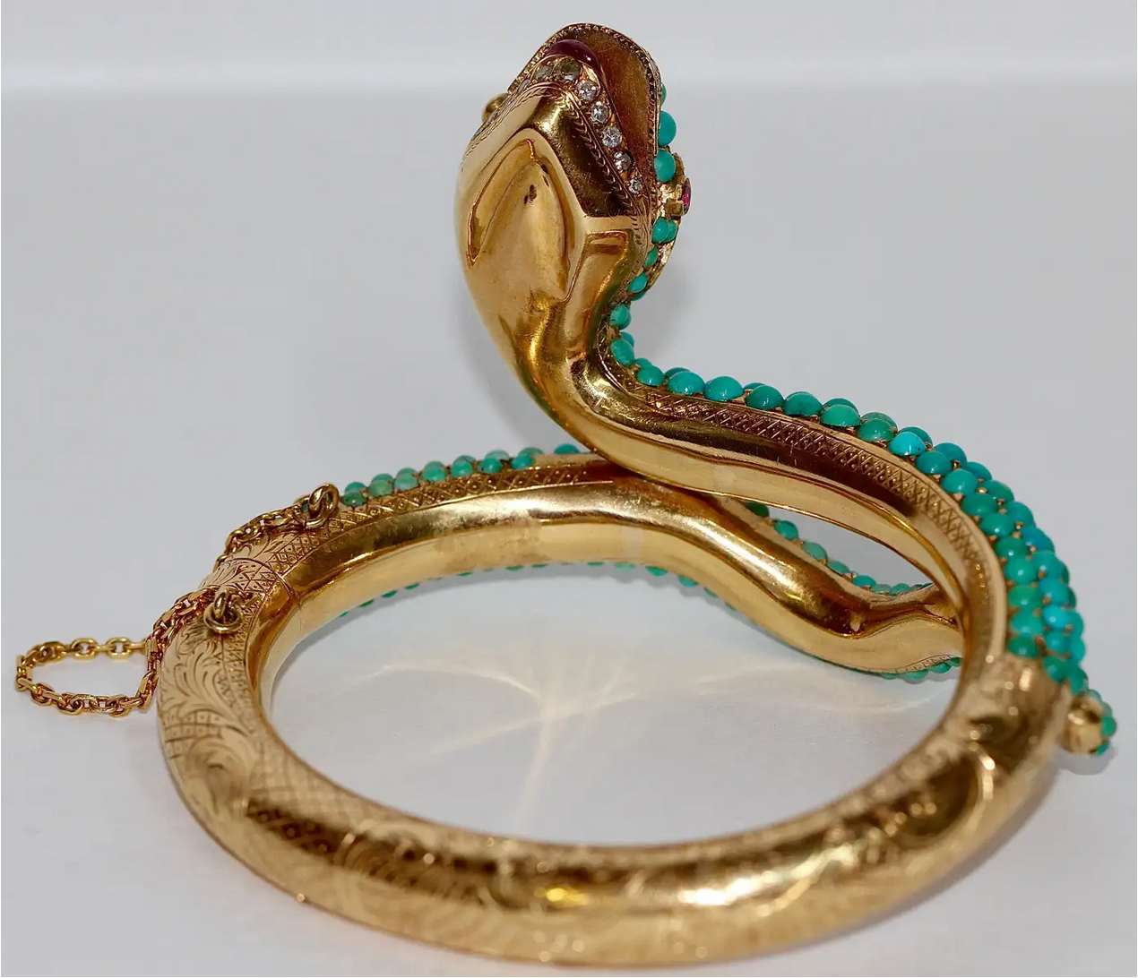 Prächtiger Schlangen-Reif Gelbgold mit Türkisen, Rubinen und Diamanten – um 1900